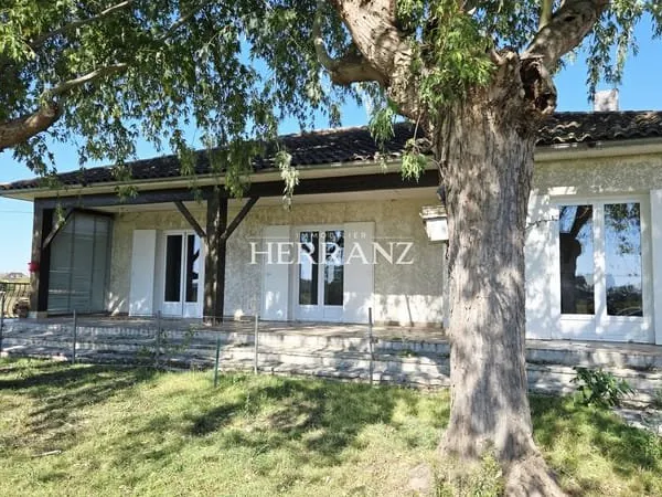 Maison de plain-pied - 110m2 - Sous-sol enterré.