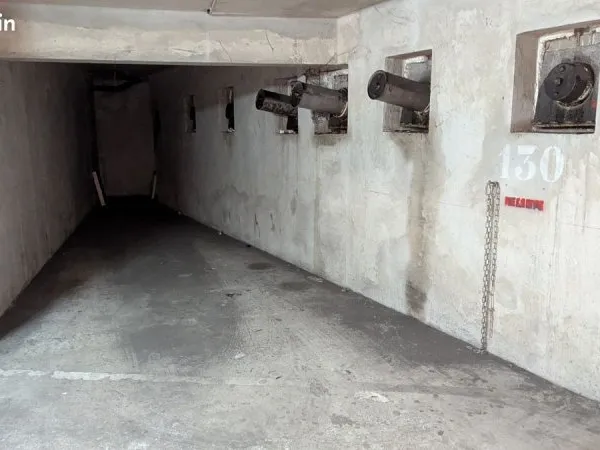 Grande place de parking dans résidence sécurisée