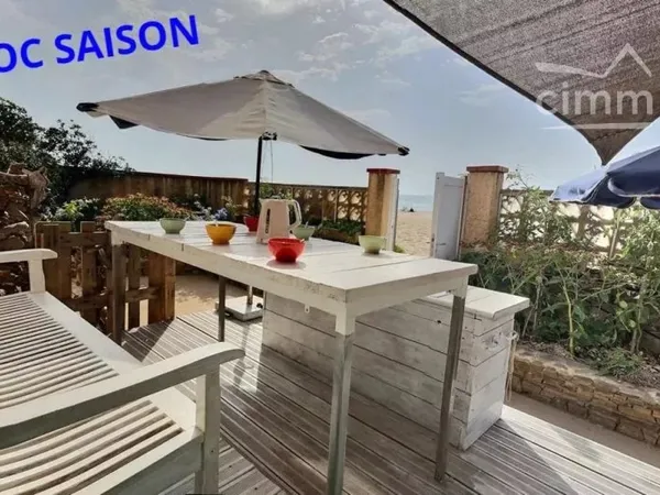 Maison les pieds dans le sable