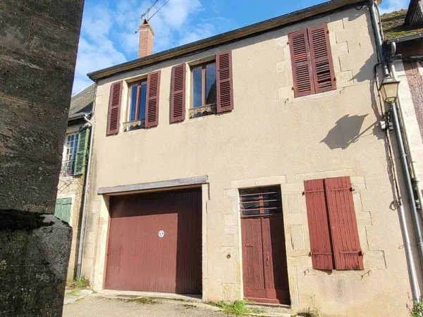 maison de ville et son grand garage