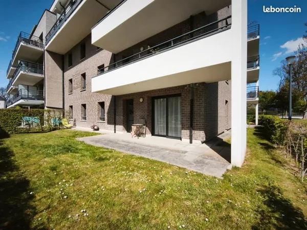 Coup de coeur assuré - 3 Pièces en rez-de-jardin en résidence de standing sécurisée-cave-parking en 