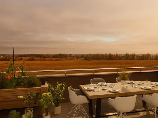 Logement type "Maison sur le toit" avec une grande terrasse