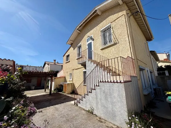 APPARTEMENT AVEC JARDIN