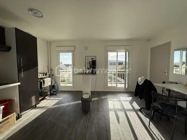 Appartement loué - Investissement locatif sécurisé - Proche université et centre-ville - Avec garage