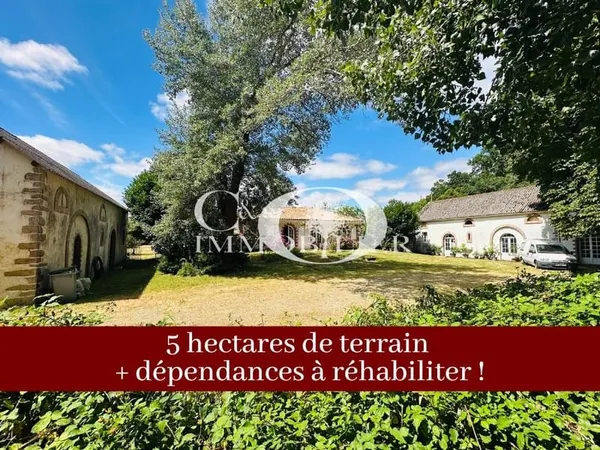 Maison de plain pied 4 chambres sur un parc d'environ 5 hect