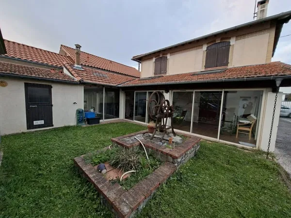 TOULOUSE MINIMES ENSEMBLE IMMOBILIER COMPRENANT UNE MAISON DE 87 M2 SUR 2 NIVEAUX ET DEUX APPARTEMEN