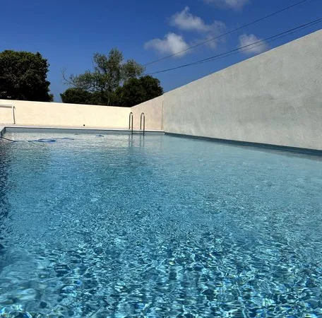 Appartement T4 avec piscine et 2 places de parking dans loti