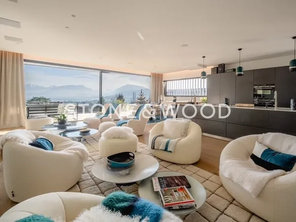 Villa contemporaine avec vue panoramique sur le lac et les m