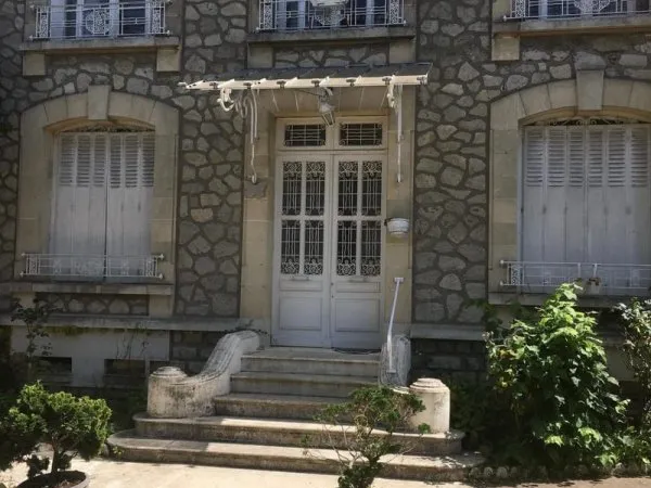 Maison bourgeoise avec jardin au centre ville