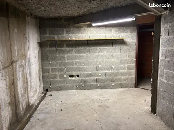 Garage 14m2 dans résidence sécurisé + box de rangement
