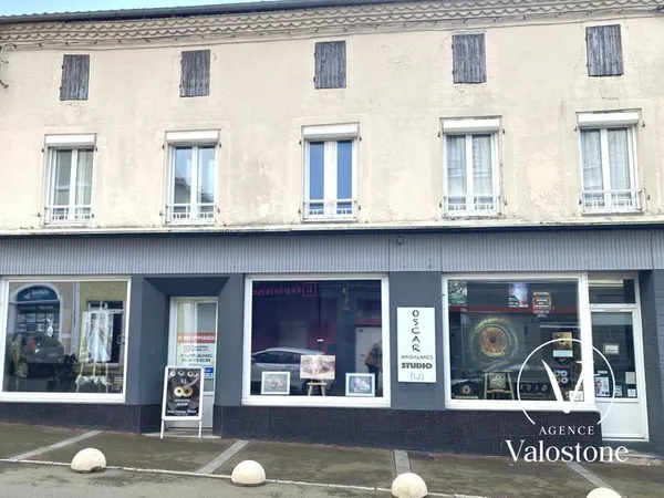 Immeuble commercial + 2 appartements