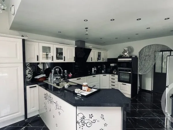 Maison 7 pièces 202 m²