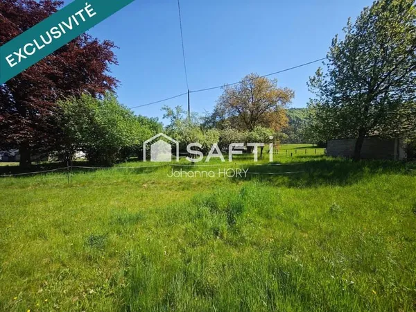 Terrain plat à bâtir et pré 30 ares