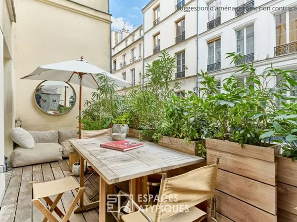 Appartement rénové avec terrasse au coeur du quartier des enfants rouges