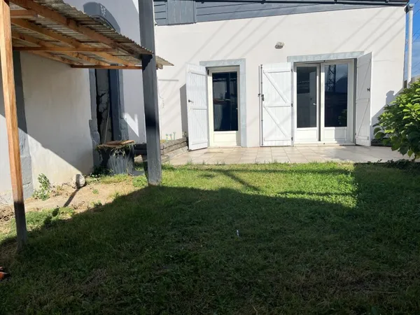 APPARTEMENT PLAIN-PIED - GARAGE - JARDINET