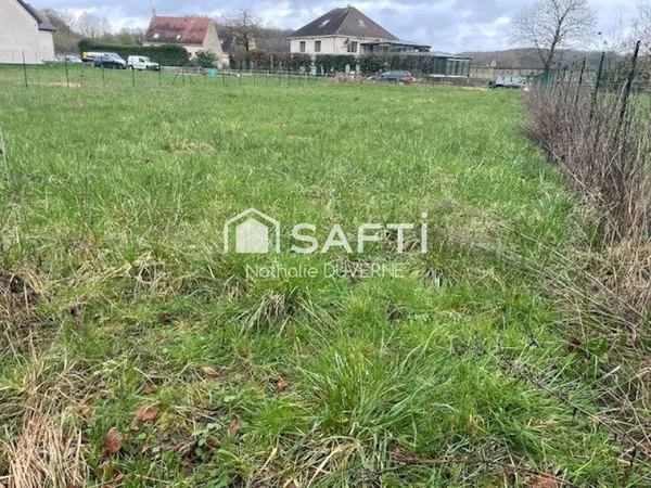 Beau terrain 961 m2 à bâtir sur 825 m2 - G1 et G2 - viabilisé - façade 19.77 ml - possibilité 2 lots