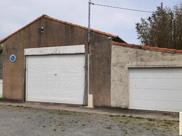 Entrepôt / atelier de 84m² et un garage 28m²