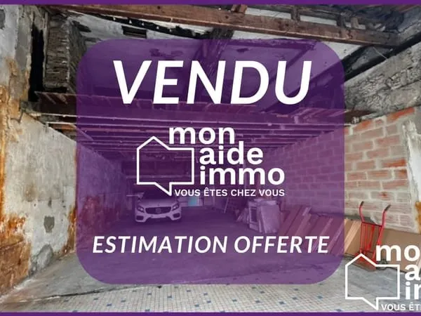 Garage en pierre de 130m² idéal investisseur plein centre-vill