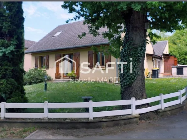 Maison individuelle avec véranda, garage et jardin
