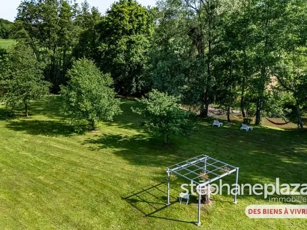 Ancien moulin du XVII° siècle bien d'exception de 331 m² avec dépendances sur 7755 m² de terrain