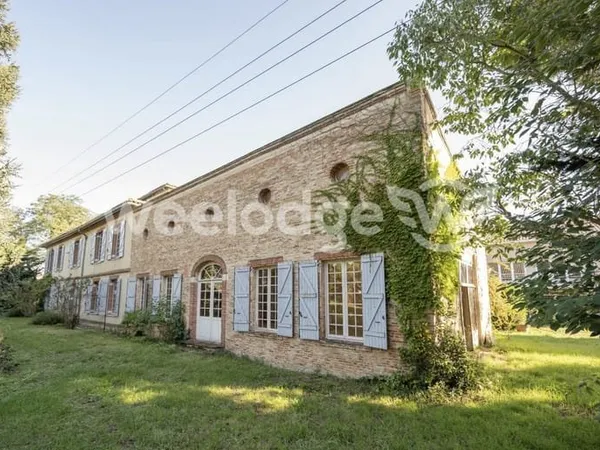AUSSONNE, DUPLEX T2 AVEC JARDINET- BÂTISSE DE CARACTÈRE RÉH