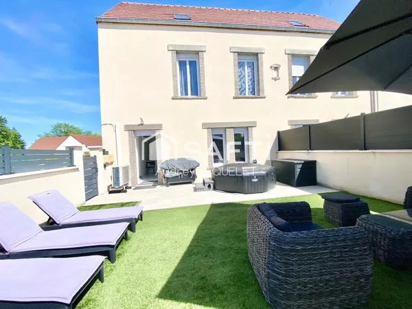 maison jumelée dans une bâtisse de caractère alliant modernité et charme de l'ancien