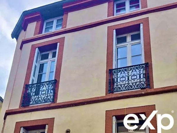 T3/T4 de 94 m² (76 m² Carrez) avec terrasse proche de la Place