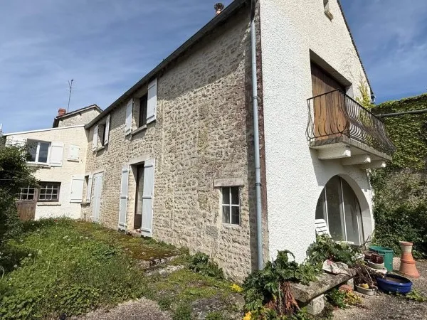Maison d'autrefois avec four à pain