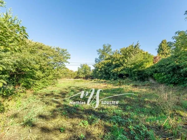 Terrain constructible 888 m² à pied du centre