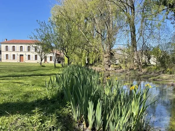 Moulin avec potentiel gîte et vue sur la rivière