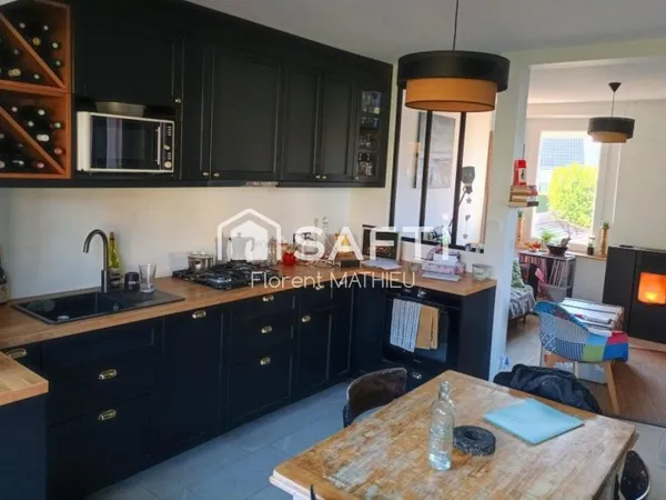 Maison Mitoyenne au calme avec jardin de 300m²