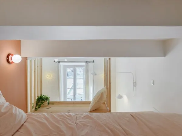 Chambre d'archi avec grands espaces communs