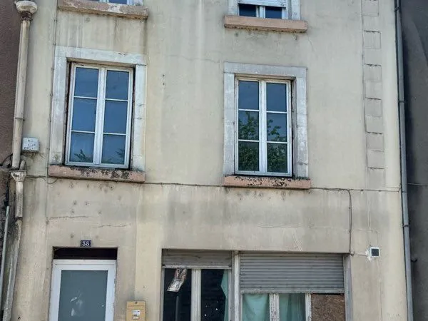 Vends une maison mitoyenne