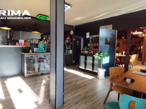 Opportunité Rare à La Mure : Murs et Fonds Pizzeria de Renom