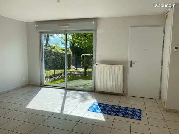 Duplex t3 avec jardinet et garage ferme