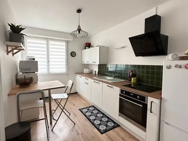 Appartement T2 - 56 m² avec terrasse, parking et cave