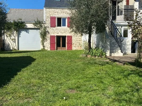 Maison avec grand jardin