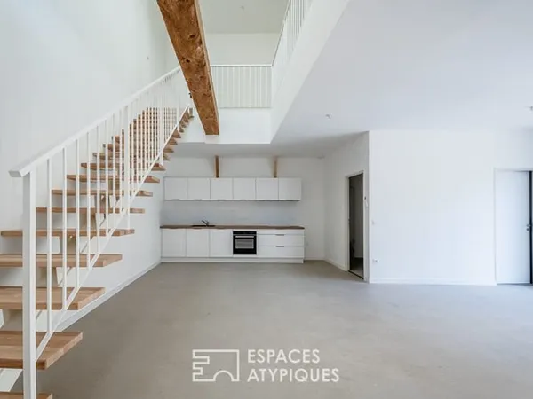 Réhabilitation d'architecte : le cachet d'une remise 1900 aux volumes épurés
