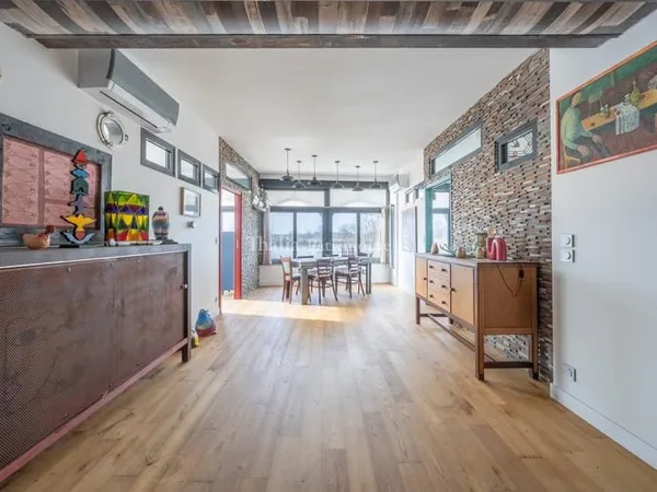 Ensemble immobilier composé de 3 appartements en bordure de