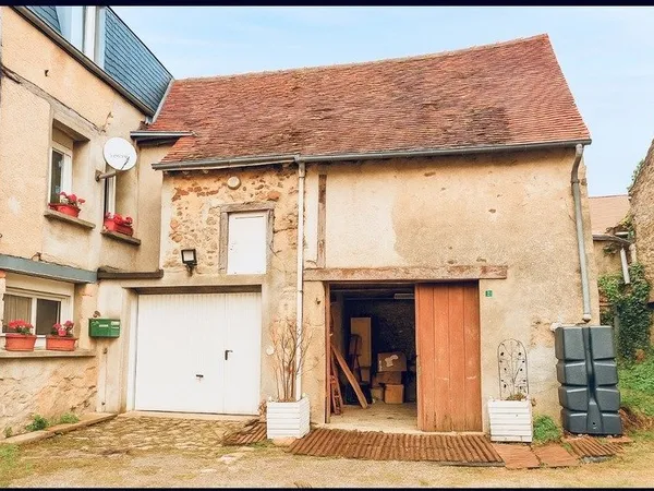 Maison de ville de 157m² avec potentiel local professionnel et dépendances, jardin 69 900€ €