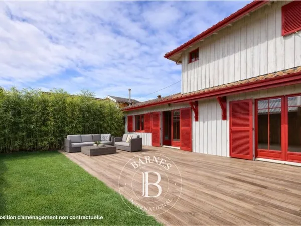 MAISON FAMILIALE EN BOIS DE 110 M² AVEC TERRASSES À PETIT PIQUEY SUR LA PRESQU'ÎLE DU CAP FERRET