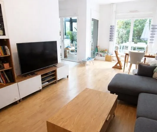 Duplex RDC avec Parking - Terrasse et jardin d'hiver