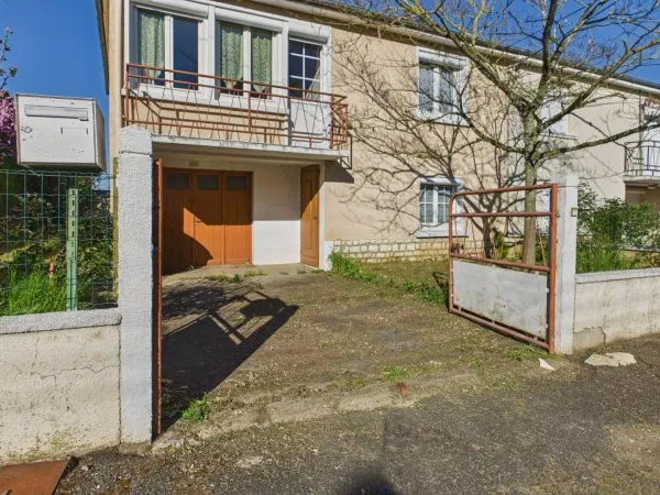 Maison à rafraîchir avec garage et jardin