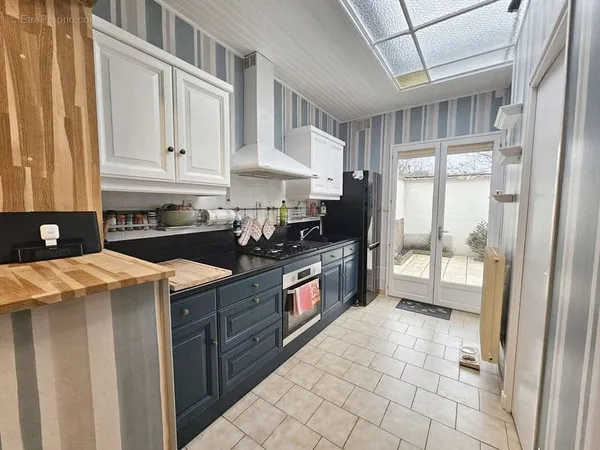 Maison 1930 - secteur delory - 90 m2 - 4 chambres - jardin de ville 30 m2