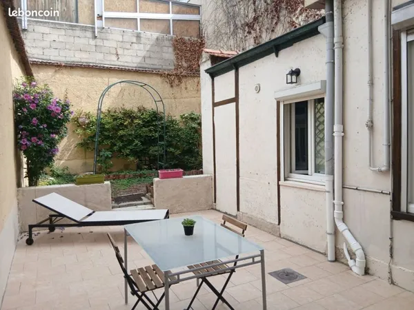 Appartement avec terrasse et jardinet
