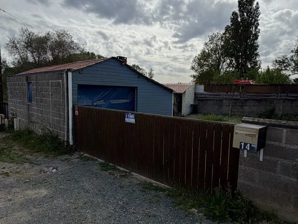 Garage avec permis d'aménager en habitation - 200m²