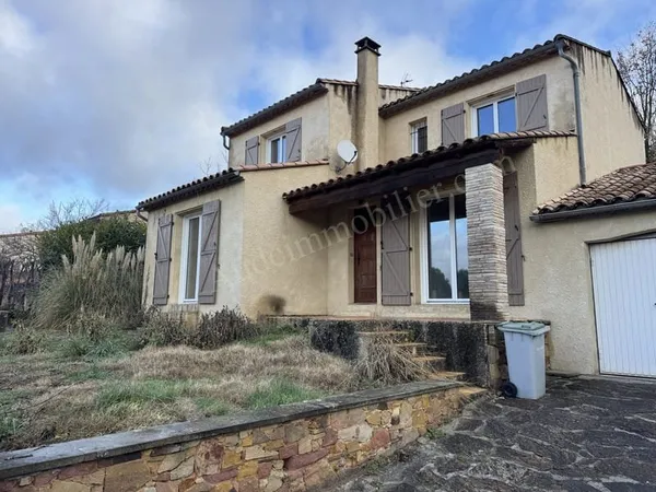 Maison avec garage et jardin