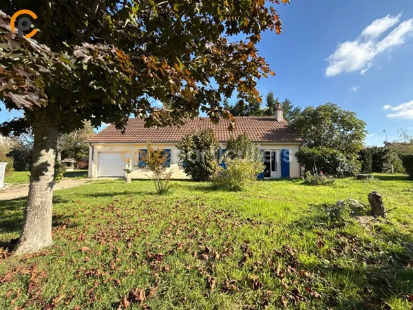Agréable pavillon plain-pied avec jardin et deux garages