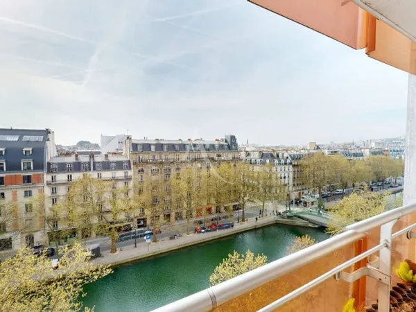 Appartement familial avec balcon, vue sur tout Paris et sur le Canal !