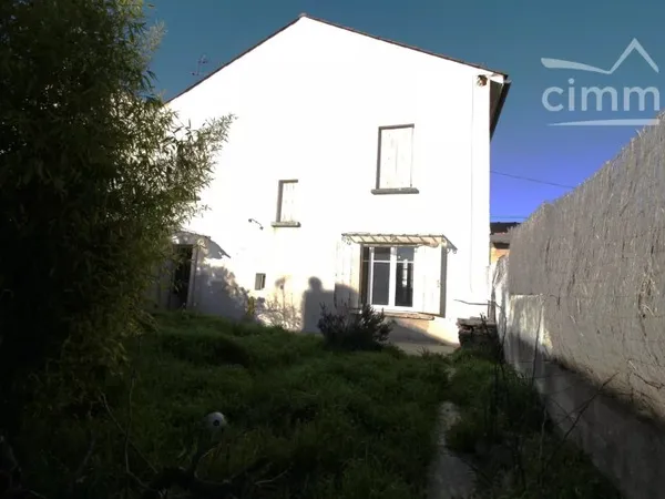 A vendre maison avec garage et jardin